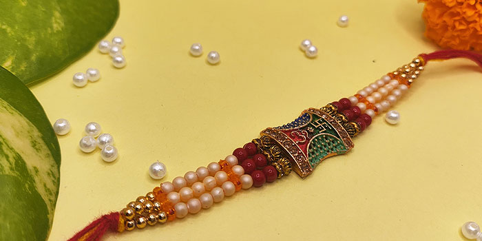 2-in-1 Design Rakhi with Om and Swastik Design and Roli - Chawal