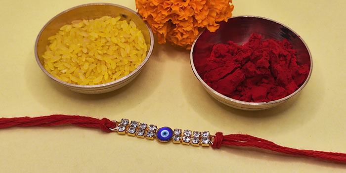 Nazarbattu Rakhi with Protection from Evil Eyes and Roli - Chawal