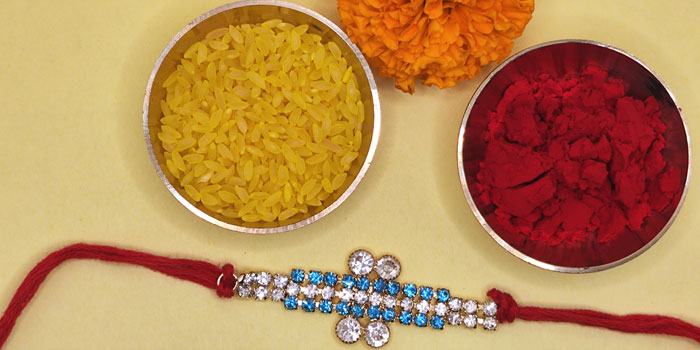 Shiny Rakhi with Blue and Golden Shine and Roli - Chawal