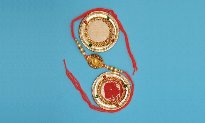 Stone Studded Designer Rakhi with Free Roli and Chawal