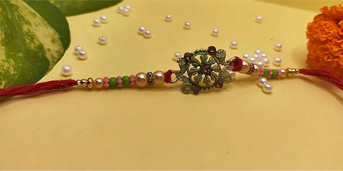 Blissful Rakhi with an Elegant Design and Roli - Chawal